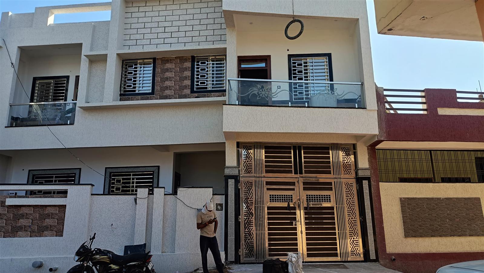 Modern home facade with glass railing