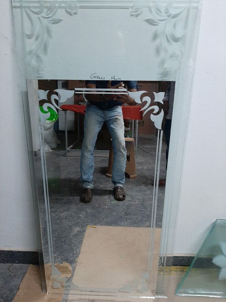 Etched designer mirror