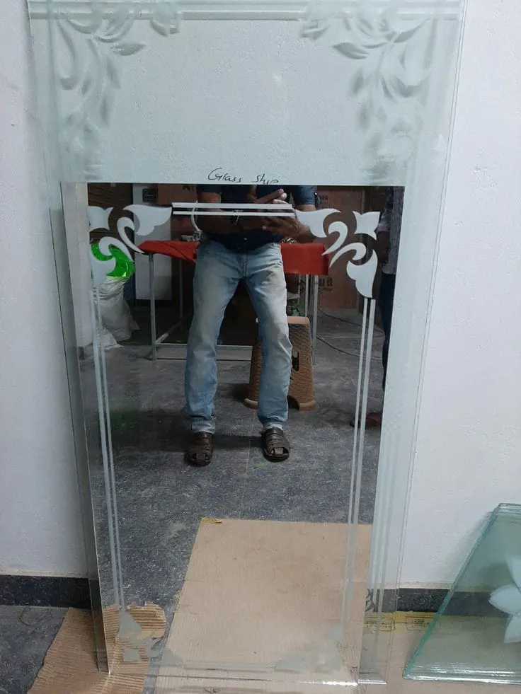 Tall etched-border dressing mirror at our workshop