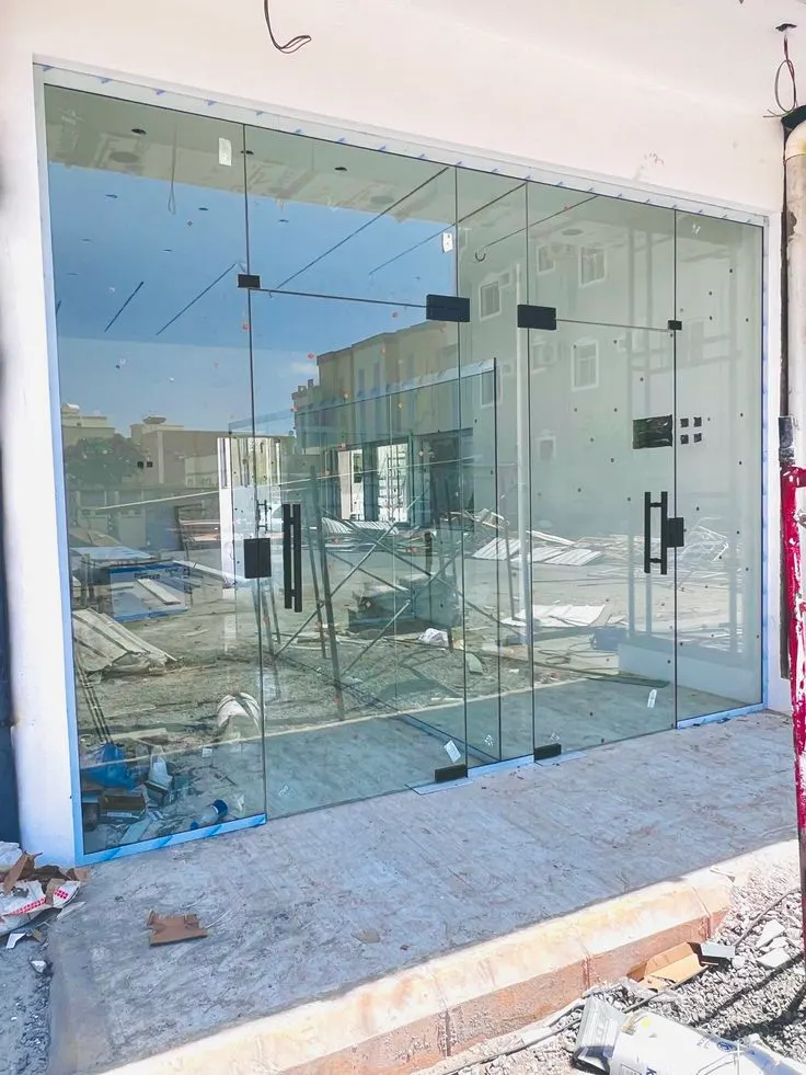 Frameless toughened glass partition installed at a commercial space